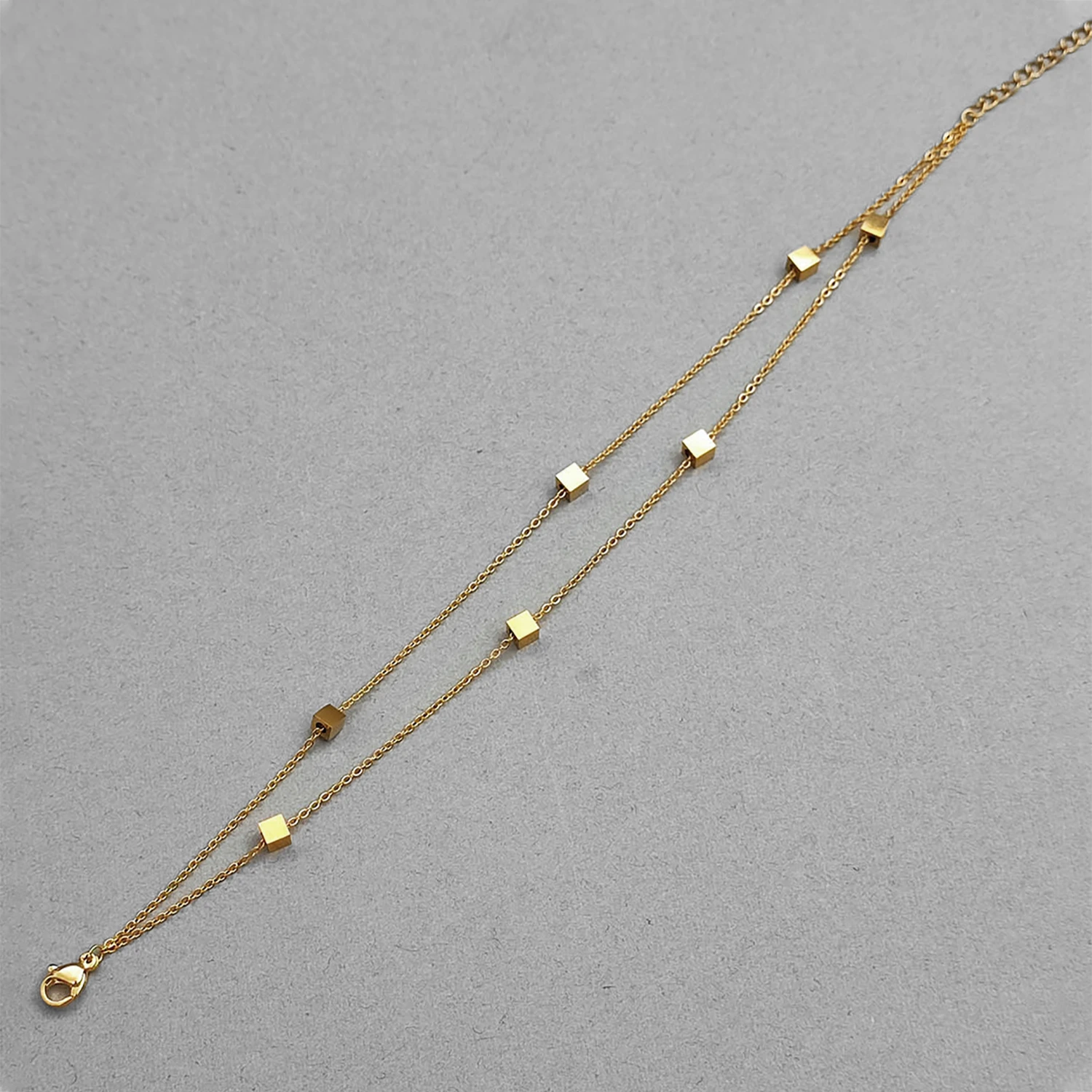 پابند استیل دو رج طرح تاس